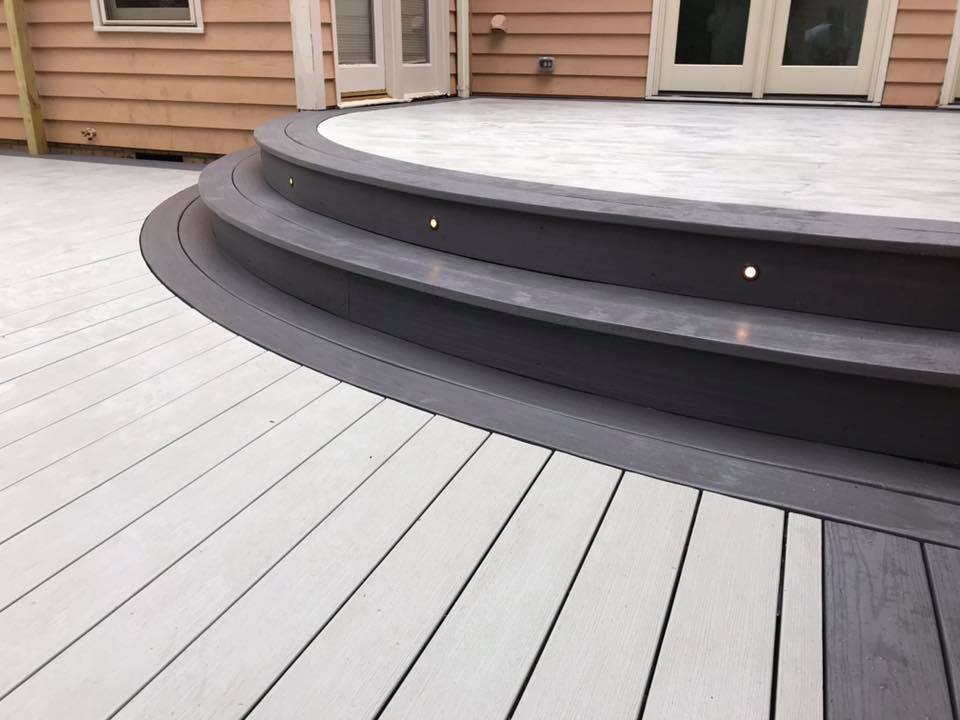 Photo of a curved deck made of composite deck boards.