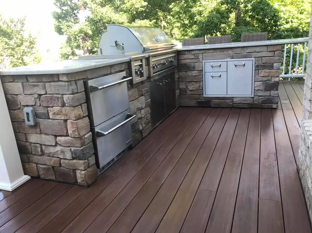 Photo of an outdoor kitchen on a TimberTech deck.