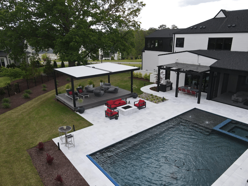 Two pergolas providing cover by pool side