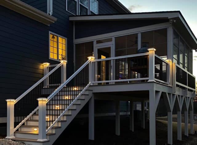 elevated deck with in-step lights and post cap lights.