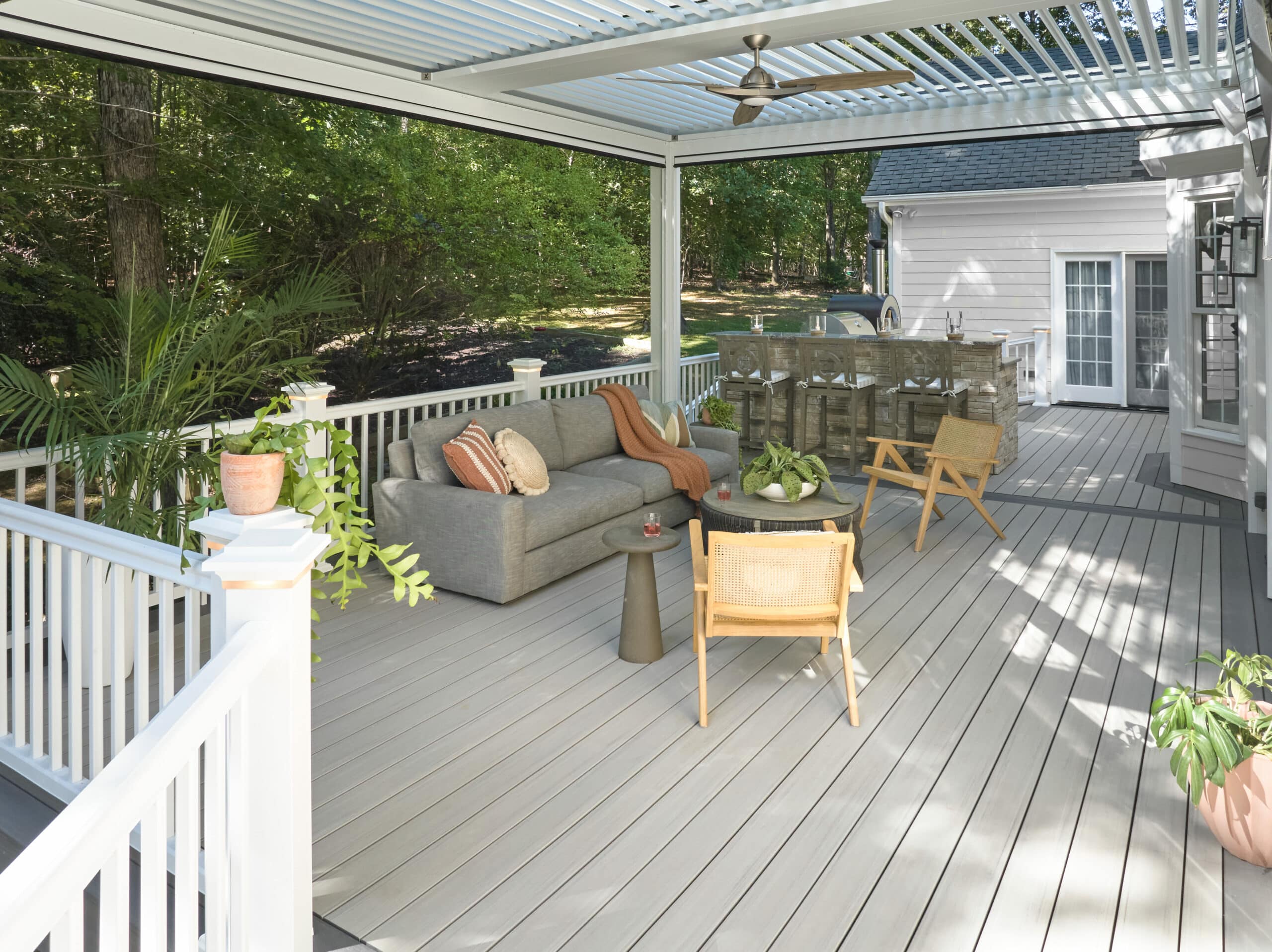 composite deck with railing, outdoor furniture, and pergola - Composite Vs Wood Decking Costs