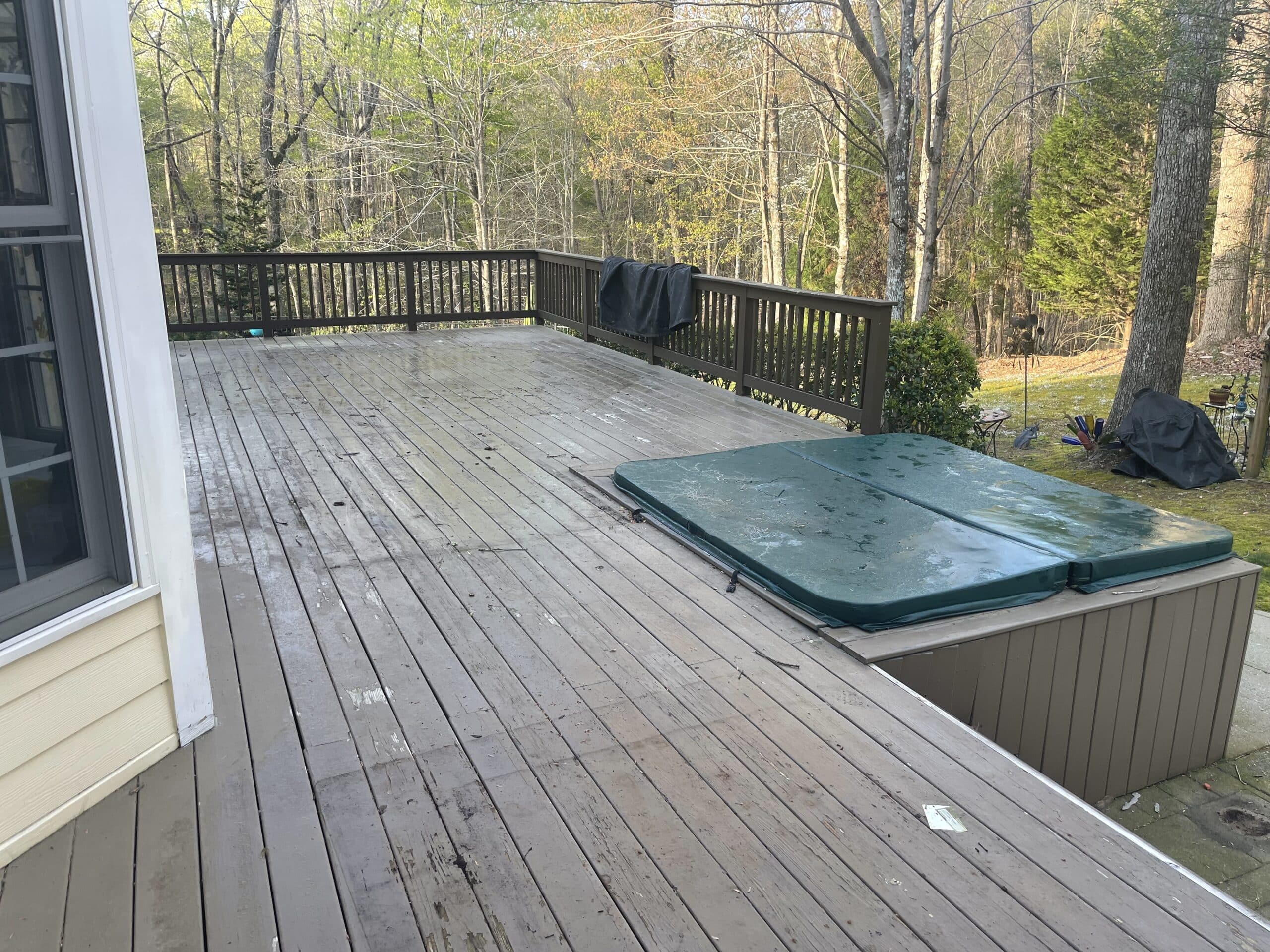 Photo of a worn out deck that is an open deck with railing - outdoor living project ideas