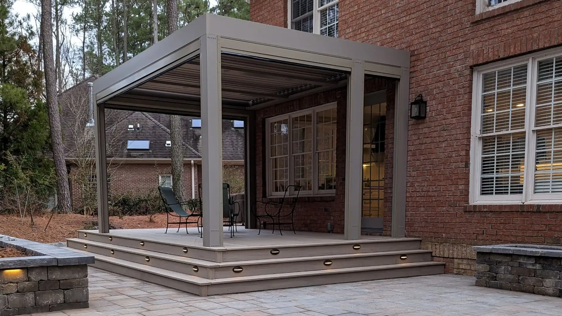 photo of a small composite deck with a pergola cover - reasons to build a composite deck