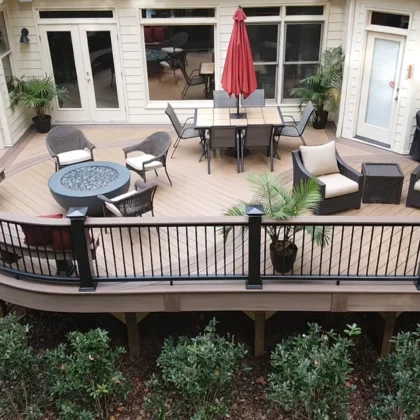 photo of a curved deck with railing