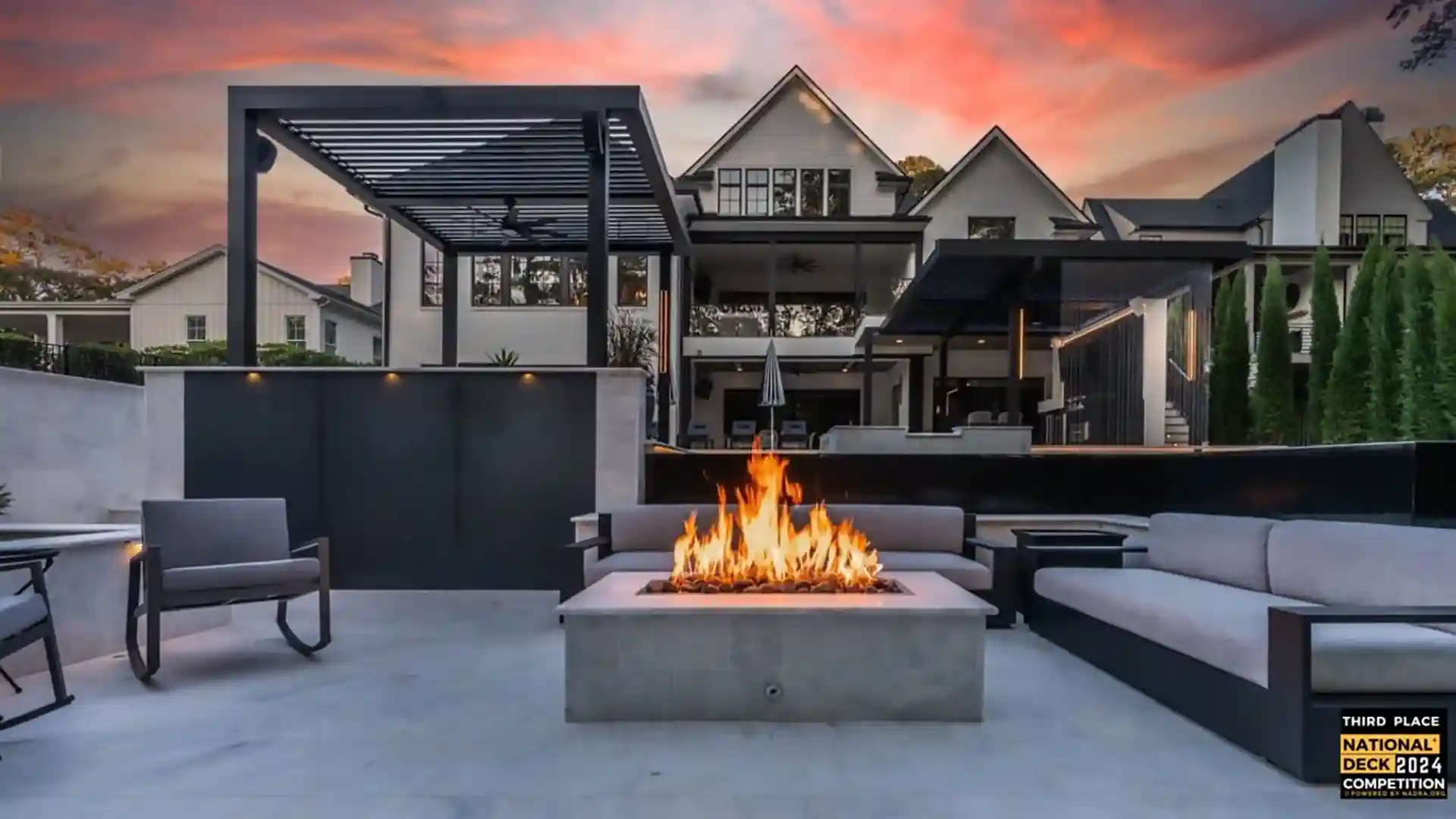 photo of a patio with a fire table and custom pergolas