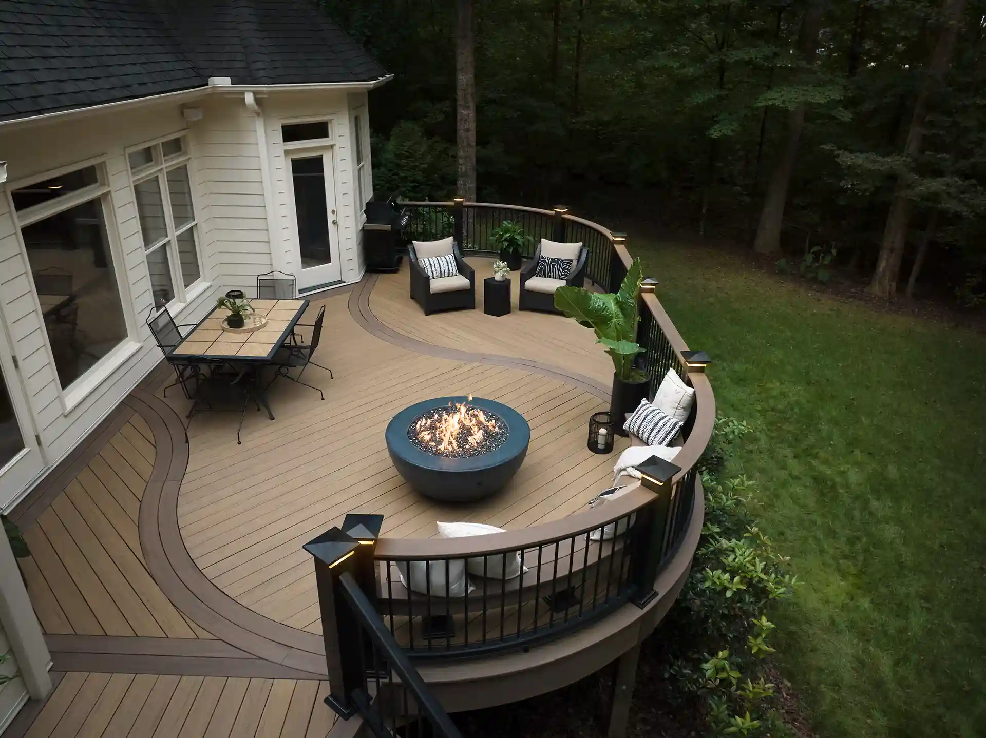 PHoto of a curved deck made with TimberTech decking, which helps mitigate the heat on the deck surface in the summer.