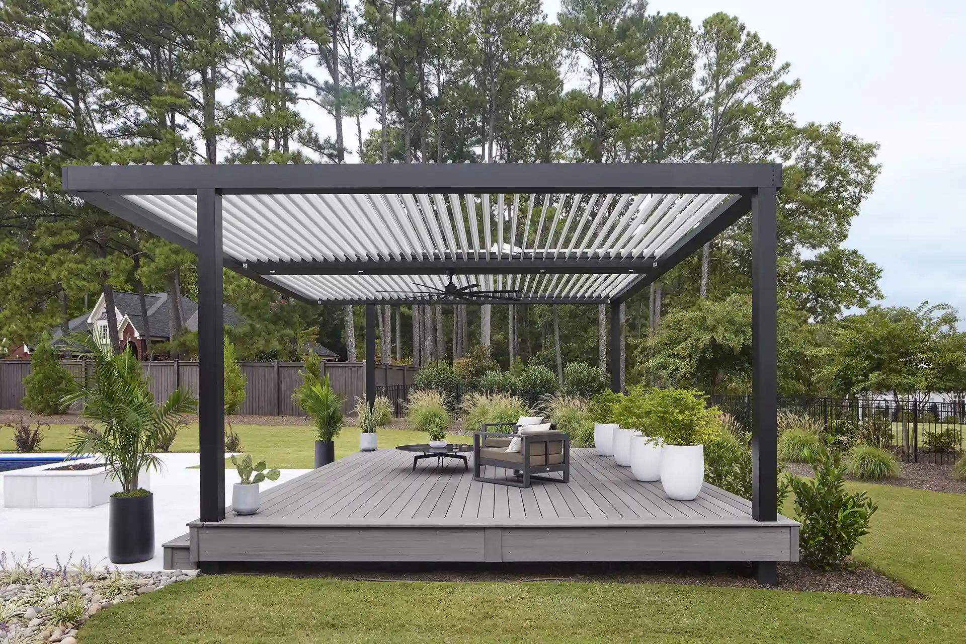 Photo of a composite deck with a pergola cover.